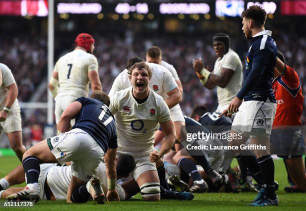 Joe Launchbury of England celebrates his sides fifth try during the RBS Six Nations match between England and Scotland at Twickenham Stadium on March...