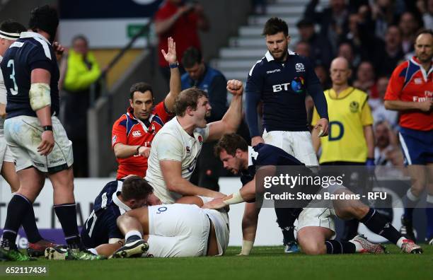 Joe Launchbury of England celebrates as teammate Billy Vunipola of England scores his team's fifth try during the RBS Six Nations match between...