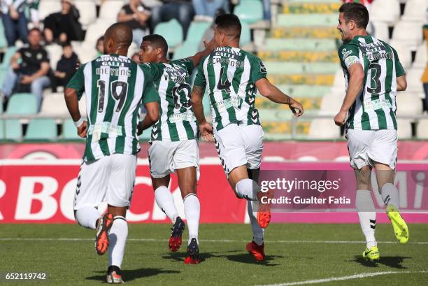 Vitoria de Setubal defender Vasco Fernandes celebrates with teammates after scoring a goal during the Primeira Liga match between Vitoria Setubal and...