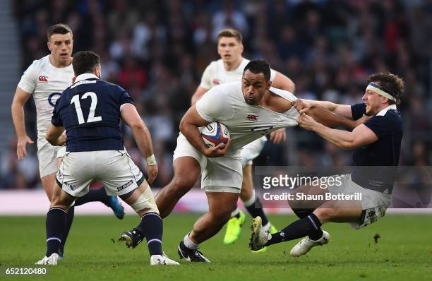 Billy Vunipola of England is tackled by Hamish Watson of Scotland during the RBS Six Nations match between England and Scotland at Twickenham Stadium...