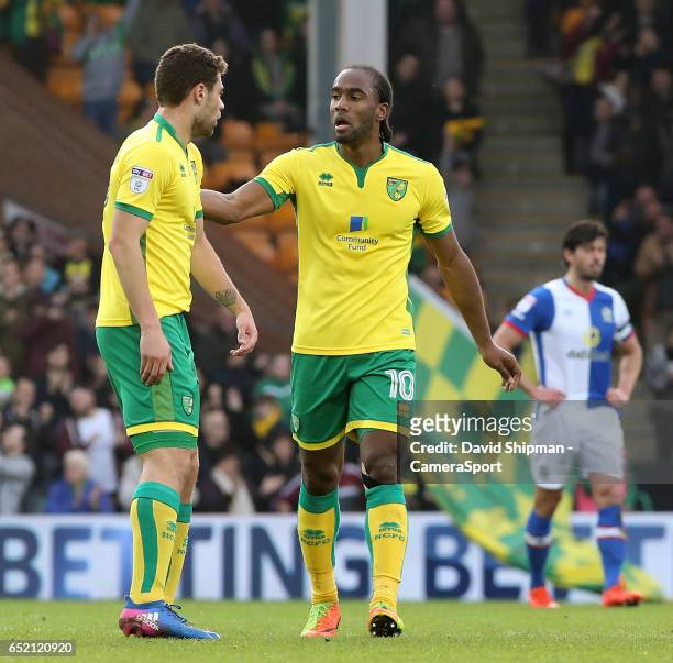 Norwich City's Cameron Jerome talks to Yanic Wildschut after making it 2-2 during the Sky Bet Championship match between Norwich City and Blackburn...
