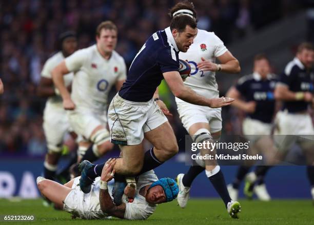 Jack Nowell of England tackles Tim Visser of Scotland during the RBS Six Nations match between England and Scotland at Twickenham Stadium on March...