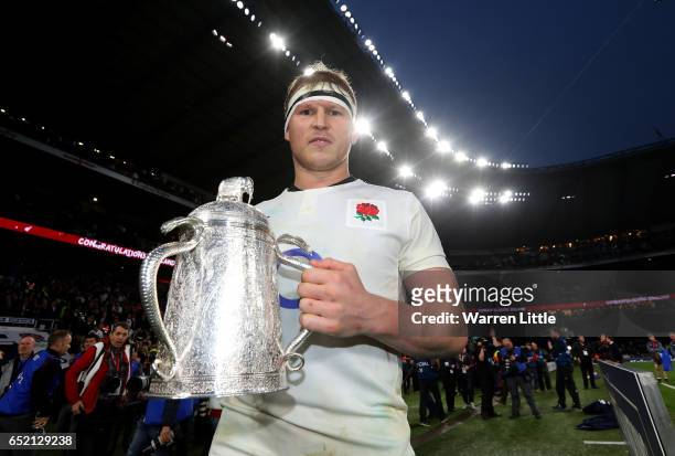 Dylan Hartley of England poses for a photograph with the The Calcutta cup after the RBS Six Nations match between England and Scotland at Twickenham...