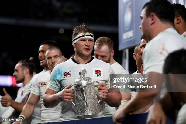 Dylan Hartley of England celebrates winning the The Calcutta cup with his England team mates after the RBS Six Nations match between England and...