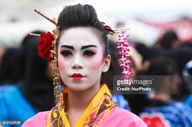 Local people apply makeup like Japanese woman durinn Penang Yakosai Parade at the Esplanade,Penang,Malaysia on March 11,2017. Penang's BIG...