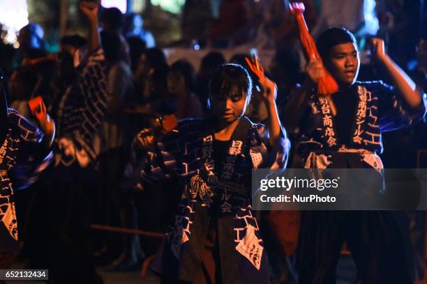 Dancers perform at a parade during the Penang Yosakoi parade in Penang, Malaysia on March 11,2017. Penang's BIG Japanese-style Dance &amp; Cultural...