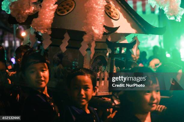 Japanese children studying in Penang carrying the shrine during Penang Yakosai Parade at the Esplanade,Penang,Malaysia on March 11,2017. Penang's BIG...