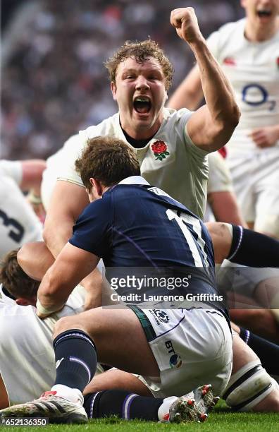Joe Launchbury of England celebrates his sides fifth try during the RBS Six Nations match between England and Scotland at Twickenham Stadium on March...