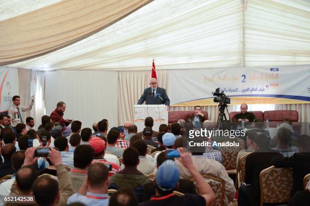 Moroccan Prime Minister Abdelilah Benkirane delivers a speech during the event organized by Justice and Development Party in Oualidia, Morocco on...
