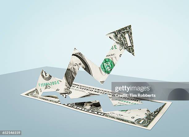 paper-cut dollar - growth arrow - eén dollar amerikaanse dollar stockfoto's en -beelden