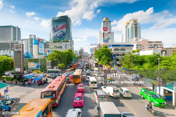 bangkok cityscape, business district with high building at dusk (bangkok, thailand) - bangkok street stock pictures, royalty-free photos & images
