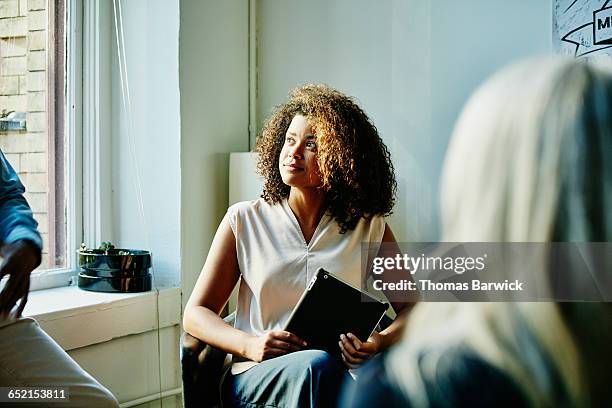 businesswoman in project meeting in startup office - meeting silence stock pictures, royalty-free photos & images