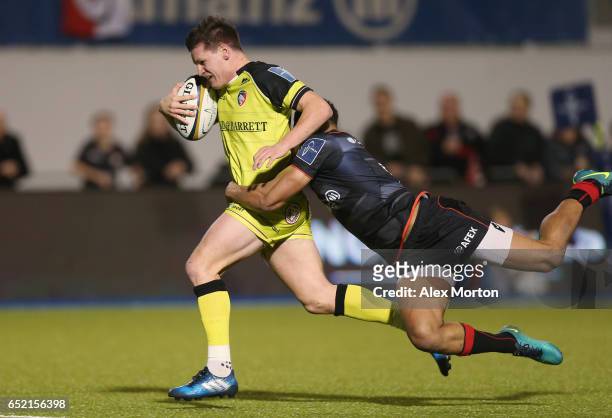 Freddie Burns of Leicester runs through to score their fourth try during the Anglo-Welsh Cup: Semi Final match between Saracens and Leicester Tigers...