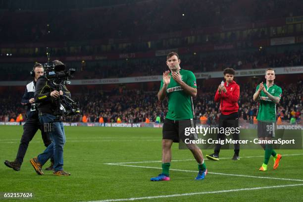 Lincoln City's Matt Rhead applauds the away fans after the Emirates FA Cup Quarter-Final match between Arsenal and Lincoln City at Emirates Stadium...