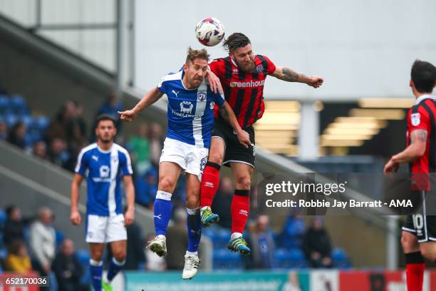 Angel Martinez of Chesterfield and Gary Deegan of Shrewsbury Town during the Sky Bet League One match between Chesterfield and Shrewsbury Town at...