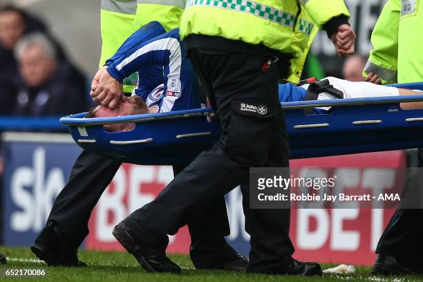 Ian Evatt of Chesterfield goes off injured on a stretcher during the Sky Bet League One match between Chesterfield and Shrewsbury Town at Proact...