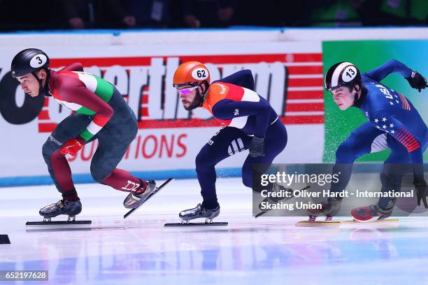 Sjinkie Knegt of Netherlands competes in the Men脗芦s 500m quarterfinals race during day one of ISU World Short Track Championships at Rotterdam Ahoy...