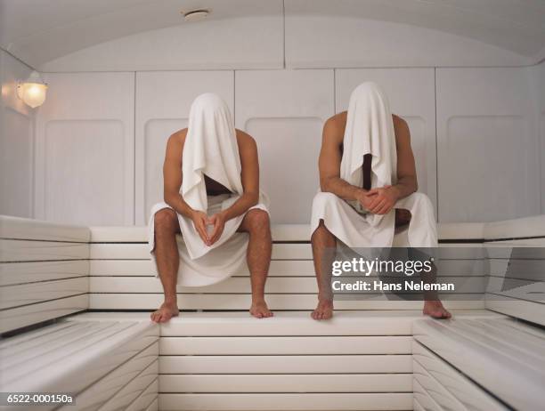 two men sitting in sauna - sauna ストックフォトと画像