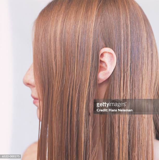 profile of young woman - ear close up stock pictures, royalty-free photos & images