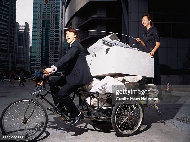 businessman riding rickshaw - trailer trash stock pictures, royalty-free photos & images