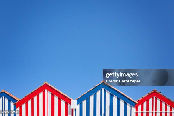 colored fisherman's house, aveiro, portugal colorful houses in costa nova, aveiro, portugal - distrito de aveiro - fotografias e filmes do acervo