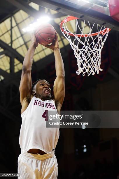 Zena Edosomwan of the Harvard Crimson dunks on the Yale Bulldogs during the second half at The Palestra during an Ivy League tournament semifinal...