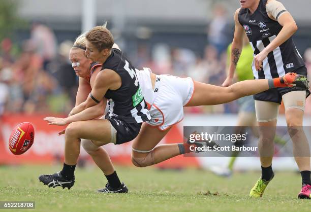 Phoebe McWilliams of the Giants and Emma Grant of the Magpies compete for the ball during the round six AFL Women's match between the Collingwood...