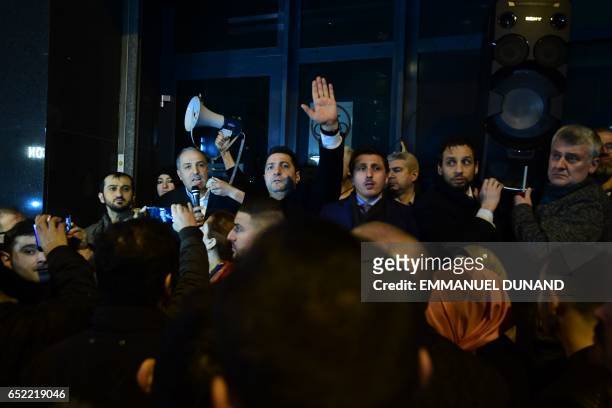 The Turkish ambassador to the Netherlands addresses Turkish residents of the Netherlands gathered for a protest outside Turkey's consulate in...