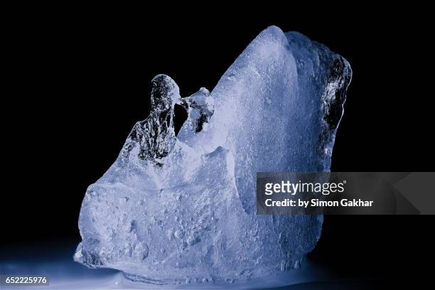 close up photograph of ice sculpture - ice sculpture stock-fotos und bilder