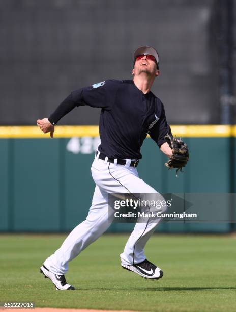 Brendan Ryan of the Detroit Tigers fields during the Spring Training game against the Pittsburgh Pirates at Publix Field at Joker Marchant Stadium on...