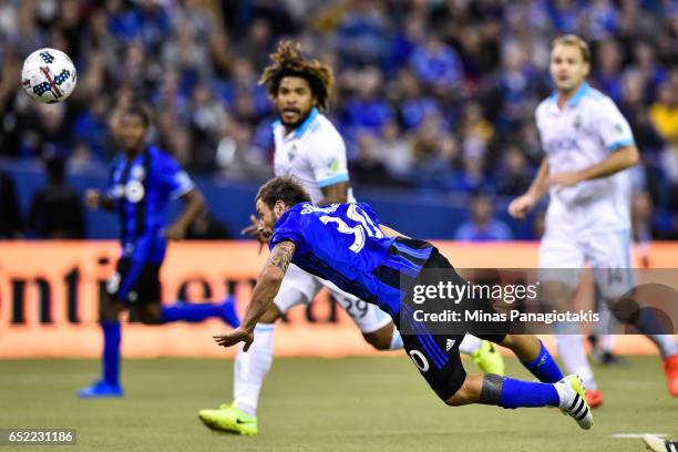 March 11: Hernan Bernardello of the Montreal Impact jumps to play the ball with his head during the MLS game against the Seattle Sounders FC at...