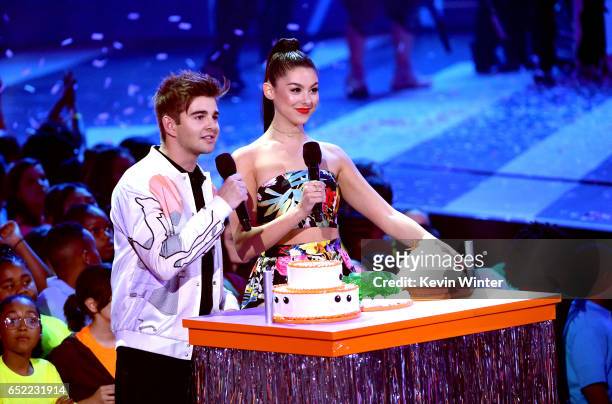 Actors Jack Griffo and Kira Kosarin speak onstage at Nickelodeon's 2017 Kids' Choice Awards at USC Galen Center on March 11, 2017 in Los Angeles,...