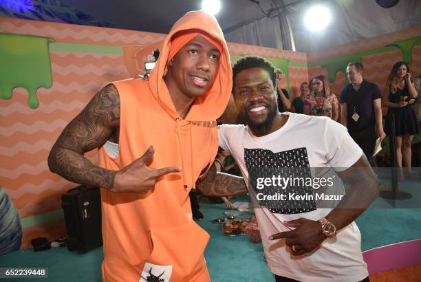 Personality Nick Cannon and actor Kevin Hart at Nickelodeon's 2017 Kids' Choice Awards at USC Galen Center on March 11, 2017 in Los Angeles,...