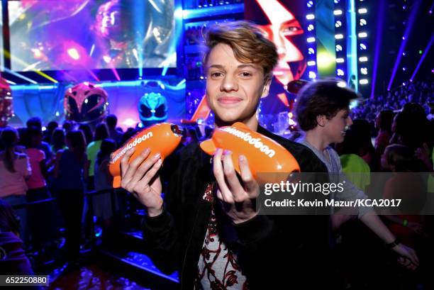 Actor Jace Norman poses with awards for Favorite Male TV Star and Favorite TV Show  Kids' Show for 'Henry Danger' backstage at Nickelodeon's 2017...