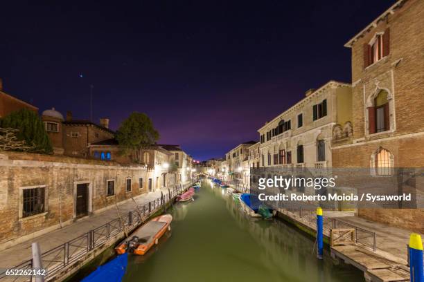night view of the typical boats venice - venetian lagoon stock pictures, royalty-free photos & images