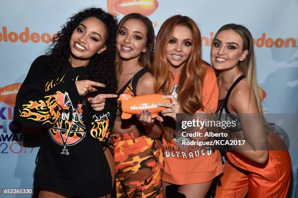 Singing Group Little Mix, Winners of Favorite Global Music Star, pose with their award backstage at Nickelodeon's 2017 Kids' Choice Awards at USC...