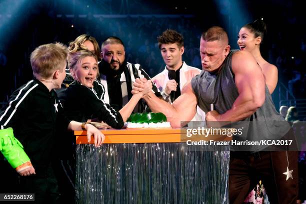 Host John Cena arm-wrestles onstage at Nickelodeon's 2017 Kids' Choice Awards at USC Galen Center on March 11, 2017 in Los Angeles, California.