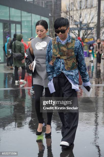 Fashion stylist Tina Leung wears Paco Raconne trousers, Lowe jacket, Casadei shoes and an A.W.A.K.E top with Style Director of MEN'S UNO Declan Chan...