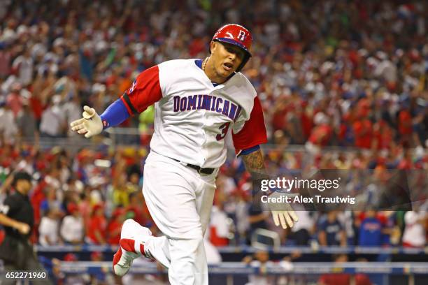 Manny Machado of Team Dominican Republic reacts to hitting a solo home run in the sixth inning during Game 4 Pool C of the 2017 World Baseball...