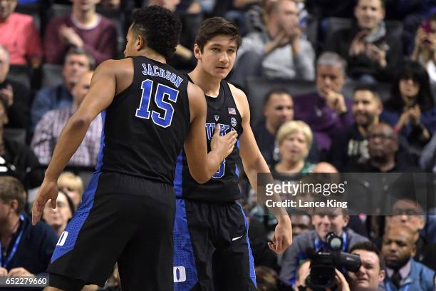 Frank Jackson and Grayson Allen of the Duke Blue Devils react against the Notre Dame Fighting Irish during the ACC Basketball Tournament Championship...