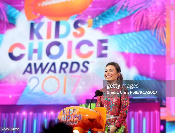 Actor Miranda Cosgrove speaks onstage at Nickelodeon's 2017 Kids' Choice Awards at USC Galen Center on March 11, 2017 in Los Angeles, California.