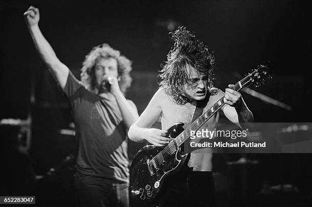 Singer Brian Johnson and guitarist Angus Young performing with Australian hard rock group AC/DC, November 1980.