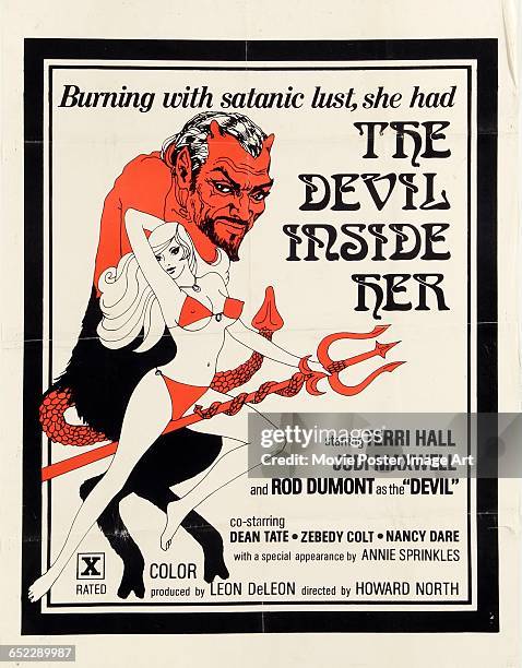 Image contains suggestive content.)A poster for the pornographic film 'The Devil Inside Her', starring Terri Hall, Jodi Maxwell and Rod Dumont as the...