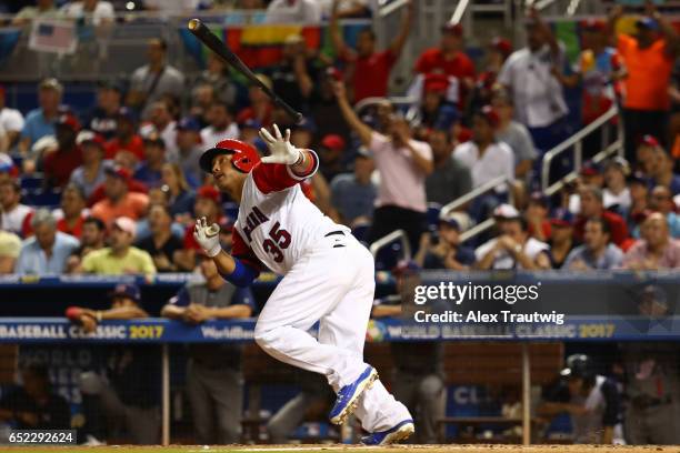 Welington Castillo of Team Dominican Republic hits an RBI double in the seventh inning during Game 4 Pool C of the 2017 World Baseball Classic...