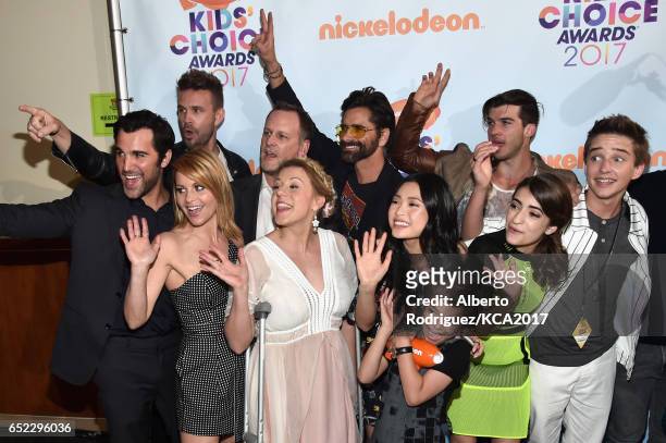 The cast of Fuller House backstage after winning the award for Favorite Family TV Show at Nickelodeon's 2017 Kids' Choice Awards at USC Galen Center...