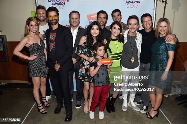 The cast of Fuller House backstage after winning the award for Favorite Family TV Show at Nickelodeon's 2017 Kids' Choice Awards at USC Galen Center...