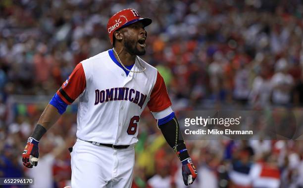 Starling Marte of the Dominican Republic is celebrates after hitting a solo home run during the eighth inning of a Pool C game of the 2017 World...