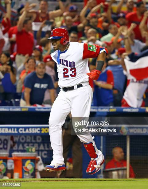 Nelson Cruz of Team Dominican Republic rounds the bases after hitting a three-run home run in the eighth inning during Game 4 Pool C of the 2017...