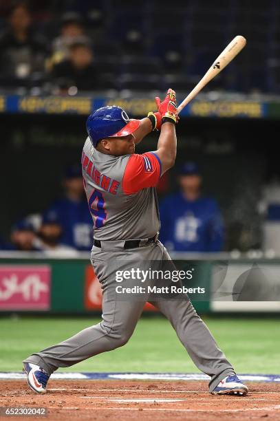 Alfredo Despaigne of Cuba hits a homer on a line drive to left center field in the second inning during the World Baseball Classic Pool E Game One...