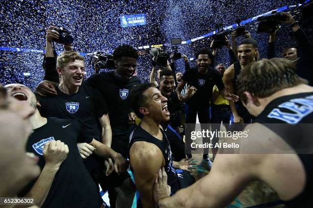 The Duke Blue Devils celebrate their 75-69 win over the Notre Dame Fighting Irish in the championship game of the 2017 Men's ACC Basketball...